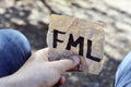 Text fml in a piece of paper Royalty Free Stock Photo