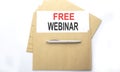 Text FREE WEBINAR on paper on envelope on the white background Royalty Free Stock Photo