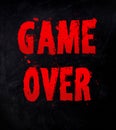 text game over in red with splashes and stains Royalty Free Stock Photo