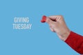 text giving tuesday and finger heart gesture