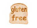 Text gluten free toasted on a slice of bread, isolated on white Royalty Free Stock Photo