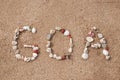 Text GOA made from shells on seashore Royalty Free Stock Photo