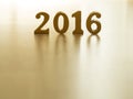 Text of gold 2016, make from wood. Golden year 2016. New year decoration, closeup on 2016 text. Happy new year 2016. Gold 2016 on Royalty Free Stock Photo