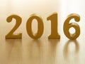 Text of gold 2016, make from wood. Golden year 2016. New year decoration, closeup on 2016 text. Happy new year 2016. Gold 2016 on Royalty Free Stock Photo