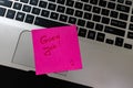 Text Good job on sticky note. Pink sticky note on keyboard Royalty Free Stock Photo