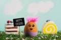 Text happy easter and handmade easter egg Royalty Free Stock Photo