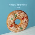 Text happy epiphany day and spanish king cake