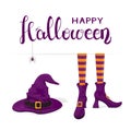 Text Happy Halloween with witches legs in shoes and purple hat Royalty Free Stock Photo