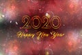Text 2020 HAPPY NEW YEAR with colorful fireworks on black background.