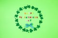 Text happy St. PAtrick`s Day and green clover ornament. Patric`s postcard design.