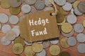 The text HEDGE FUND is a type of investment fund that pools capital from accredited individuals or institutional investors and