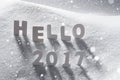 Text Hello 2017 With White Letters In Snow, Snowflakes