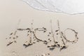 The text Hello Write on the sand beach Royalty Free Stock Photo