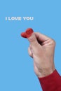 text I love you and finger heart gesture