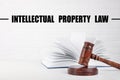 Text Intellectual Property Law over judge`s gavel and book on table Royalty Free Stock Photo