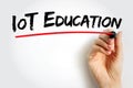Text IoT Education written with marker and underlined in red by a hand, concept for smart learning, digital technology, modern Royalty Free Stock Photo