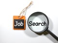 Text Jobs search on a magnifying glass white background.