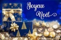 Text Joyeux Noel, Means Merry Christmas, Golden And Blue Christmas Decoration