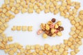 Text `JUNK` and around from English alphabet cracker with coated Popcorn on white background Royalty Free Stock Photo