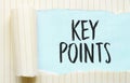 The text KEY POINTS appearing behind torn white paper Royalty Free Stock Photo