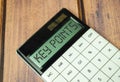 text KEY POINTS on calculator display on wooden background Royalty Free Stock Photo