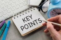 text KEY POINTS on the short note texture background with pen Royalty Free Stock Photo