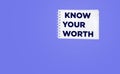 Text Know your worth in notepad on purple background. business concept Royalty Free Stock Photo