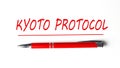 Text KYOTO PROTOCOL with ped pen on the white background Royalty Free Stock Photo