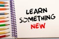 text Learn Something New on white paper Royalty Free Stock Photo