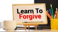 Text Learn to Forgive written with letters