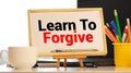 Text Learn to Forgive written with letters Royalty Free Stock Photo