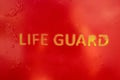 Text Life Guard sprayed a the wall of a life guard stand Royalty Free Stock Photo