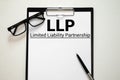 text Limited Liability Partnership - LLP on white paper