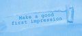 The text Make a good first impression appearing behind torn brown paper Royalty Free Stock Photo