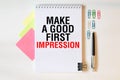 Text Make a good first impression on notebook page Royalty Free Stock Photo