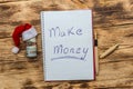 Text `Make money` with dollars, laptop and calculator Royalty Free Stock Photo