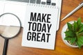 Text MAKE TODAY GREAT on the notepad with office tools, pen Royalty Free Stock Photo