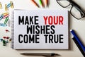 Text make your dream come true on the short note texture background. Royalty Free Stock Photo