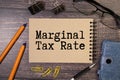 text Marginal Tax Rate on noteboock, business concept