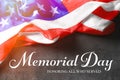 Text MEMORIAL DAY and USA flag on gray background.