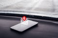 Text message notification icon on smartphone in car Royalty Free Stock Photo