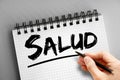 Text note - Salud Health in Spanish, concept background
