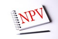 Text NPV on notebook on the white background Royalty Free Stock Photo