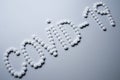 Text phrase Covid-19 sign concept made from white tablets