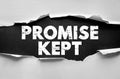 Text PROMISE KEPT on torn paper showing trust, honesty, and reliability. Concept of fulfilled commitment or assurance with bold Royalty Free Stock Photo