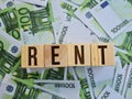 Text rent and euro banknotes closeup. Business finance rentals