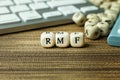 Text RMF on wooden cube for business content