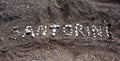 Text Santorini made with pumice stones Royalty Free Stock Photo