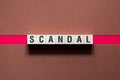 Text Scandal concept on cubes Royalty Free Stock Photo