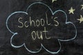 Text School`s Out and drawings on chalkboard. Summer holidays